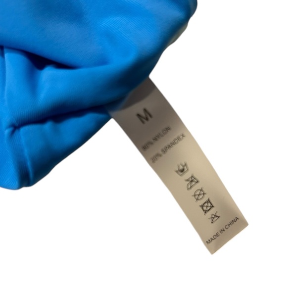 A very pretty, modest bikini in two tones of blue. Unbranded and NWOT. - Picture 2 of 6